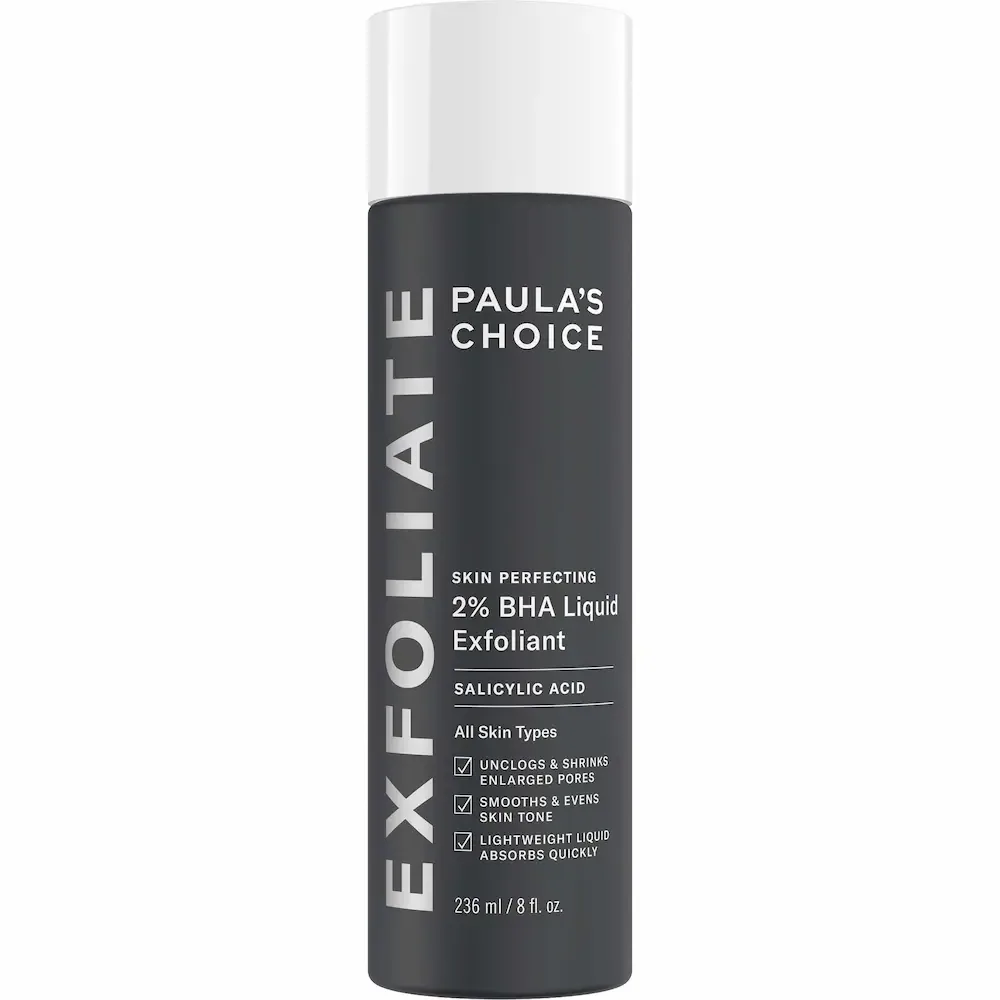 A 236 ml black bottle of Paula's Choice Skin Perfecting 2% BHA Liquid Exfoliant with salicylic acid.