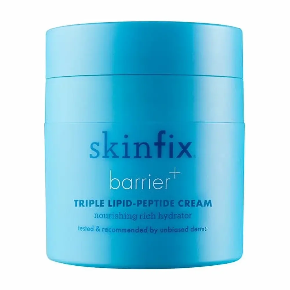 A blue jar of Skinfix Barrier+ Triple Lipid-Peptide Cream, described on the pot as a nourishing rich hydrator.
